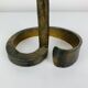 Brutalist candle holder, wrought iron with a golden patina.
