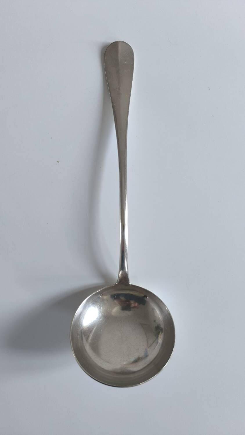 Solid silver serving ladle