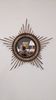 Starry sun mirror in rattan, France around 1960.
