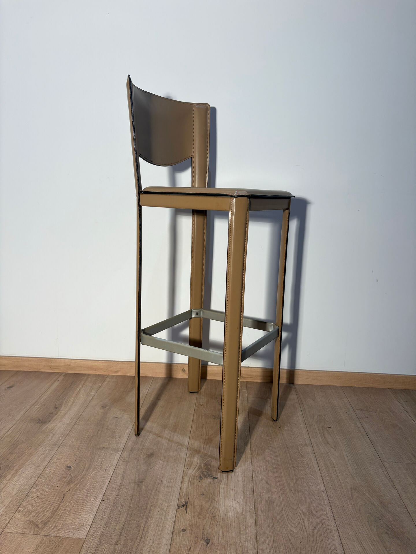 Pair of leather stools Enrico Pellizoni