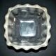 Lalique glass ashtray bowl with frosted finish, engraved with wave design, signed Lalique.