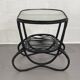 Table basse en rotin noir  et verre