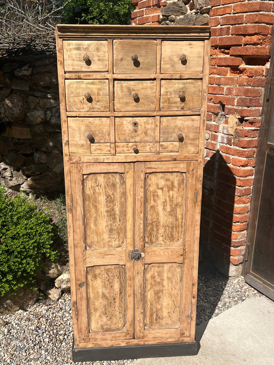 Beautiful piece of furniture with 8 drawers/2 doors in raw wood.