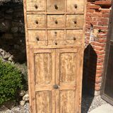 Beautiful piece of furniture with 8 drawers/2 doors in raw wood.