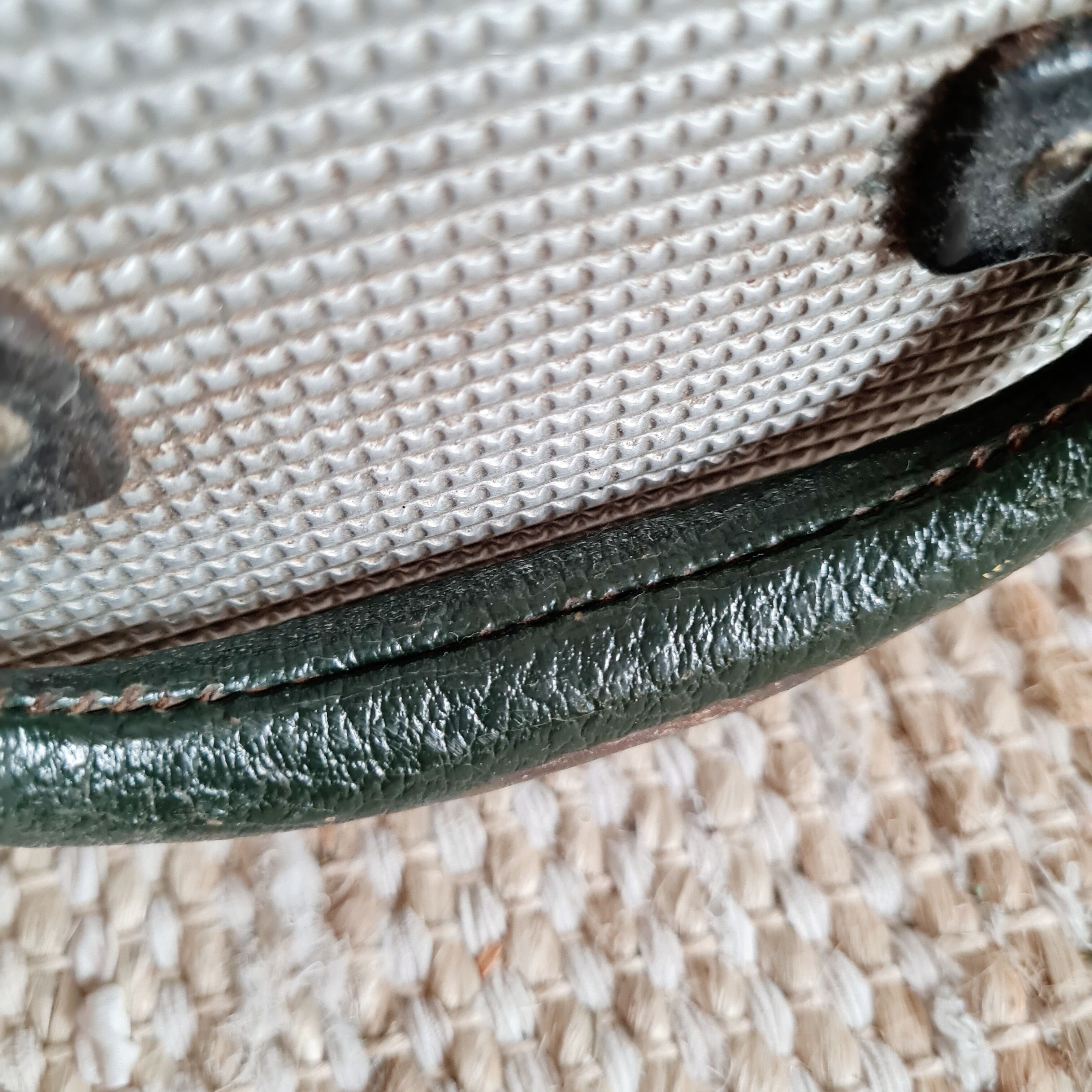 Old metal suitcase green leather handle