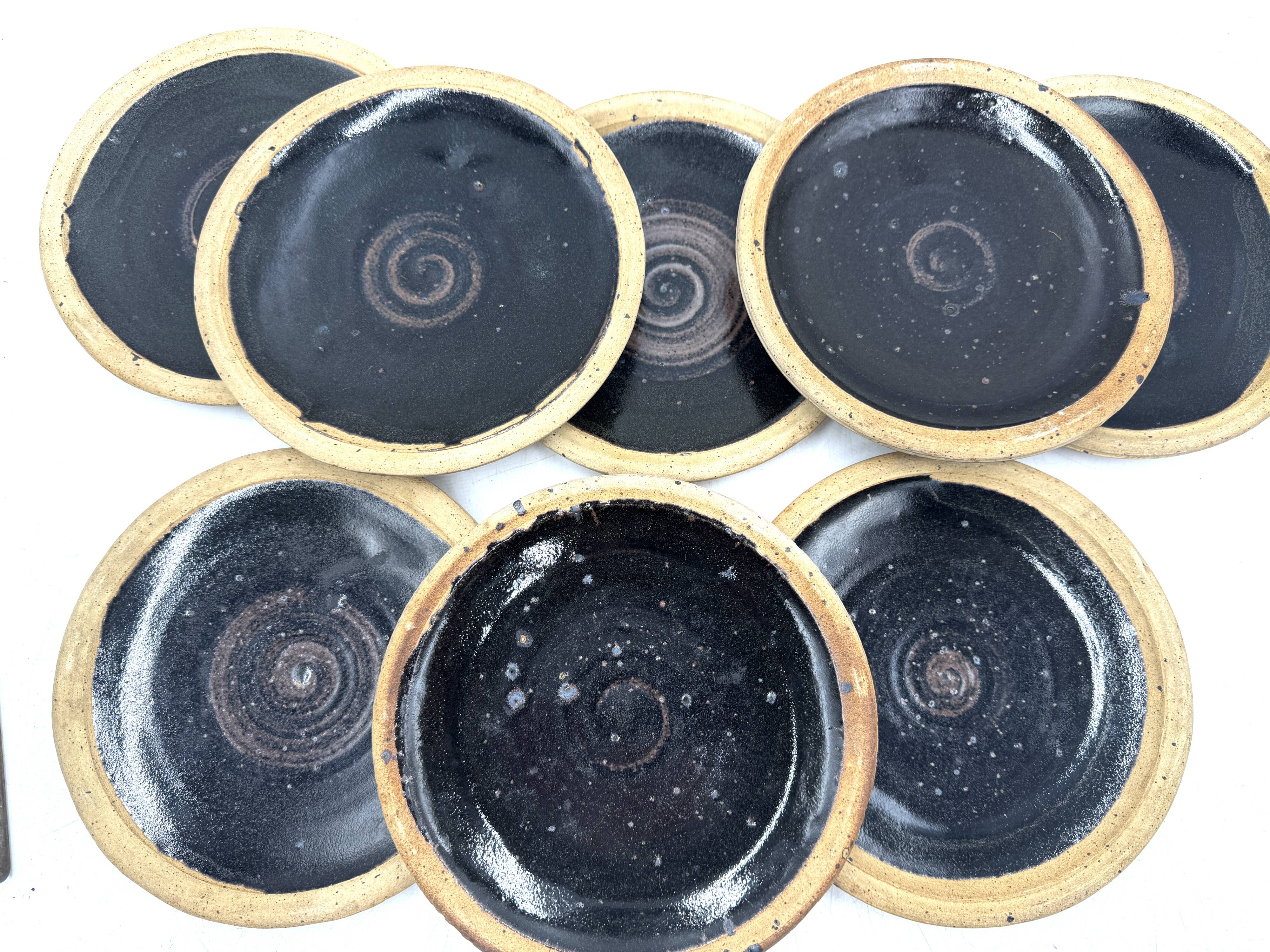 Pierre Digan 8 black stoneware plates from the 70s