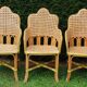 3 woven rattan armchairs