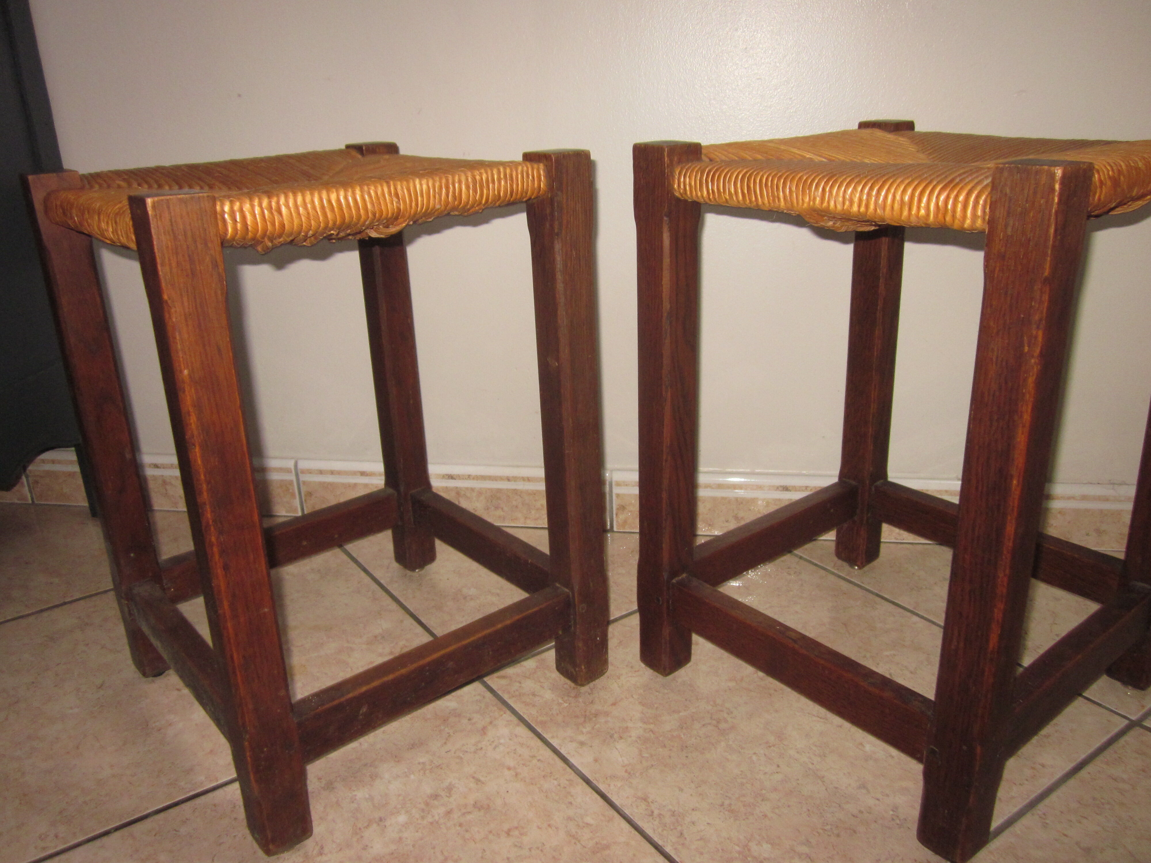 Pair of wooden and straw stools