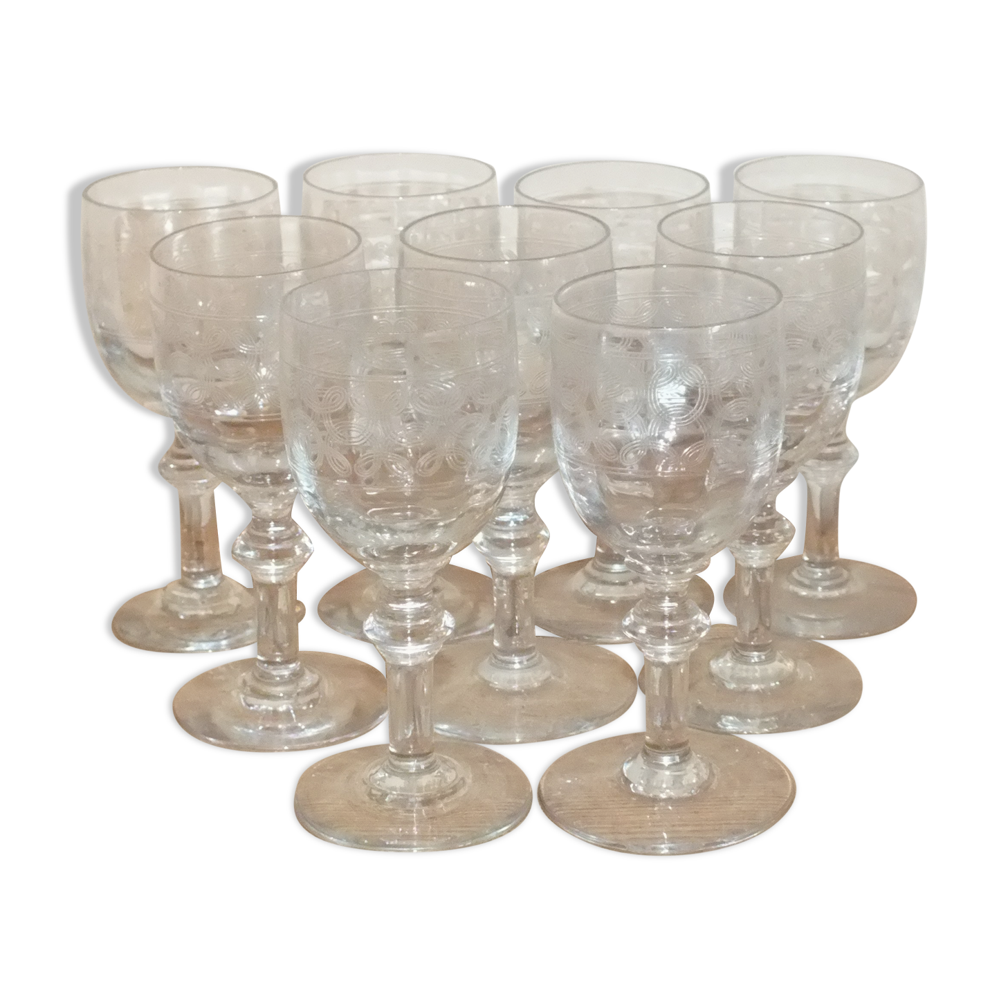 9 antique glasses in port or alcohol decorated with arabesques