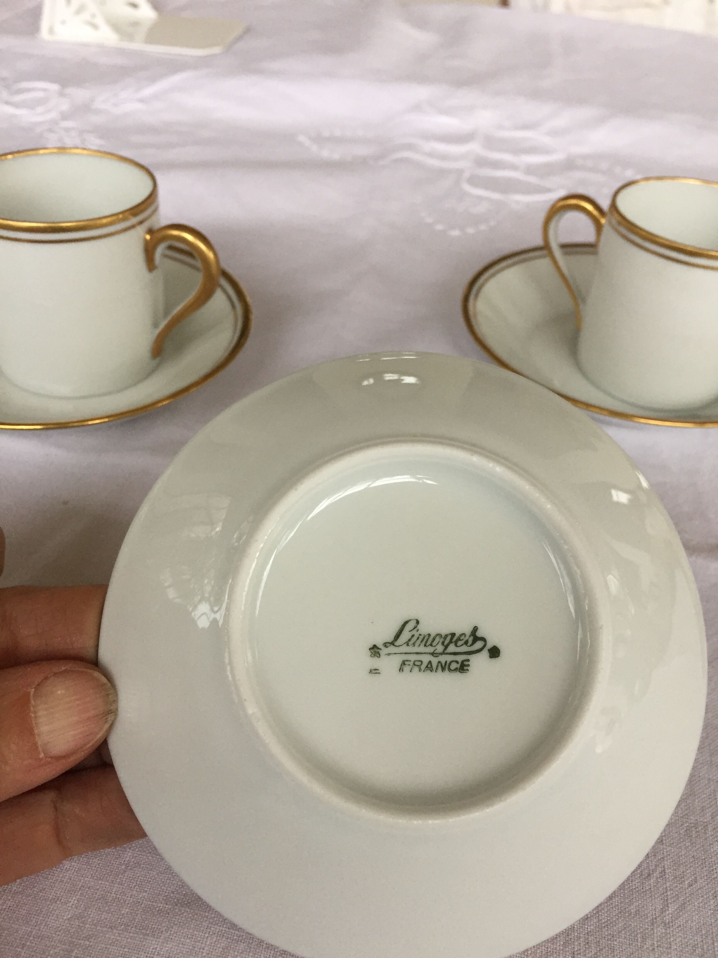 3 cups and their limoges porcelain undercup