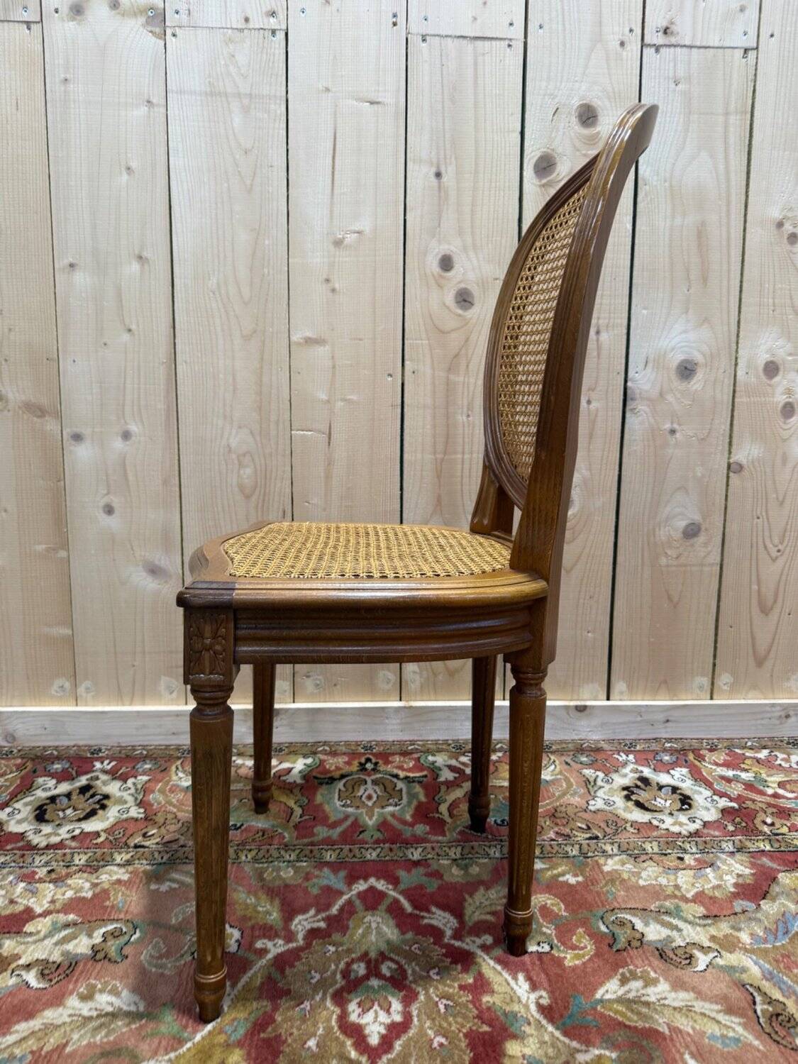Set of 6 Louis XVI medallion chairs with caning.