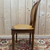 Set of 6 Louis XVI medallion chairs with caning.