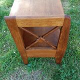 Bedside table with braces