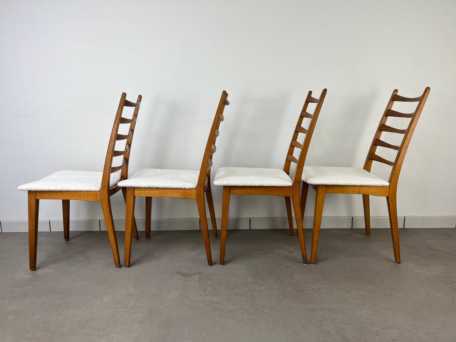 4 Scandinavian chairs, teak with boucle seats.