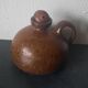 Carafe en céramique marron