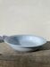 Round, flat, sky-blue ceramic salad bowl from Moulin des Loups