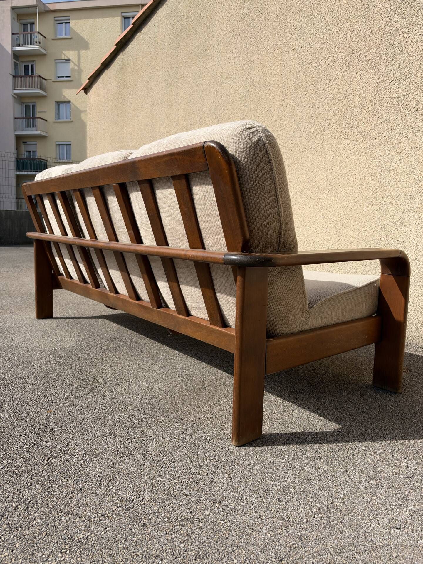 Three-seater sofa in Danish teak from the 1960s.
