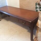 Coffee table in mahogany and leather