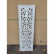 Decorative wooden panel with carved and openwork design.