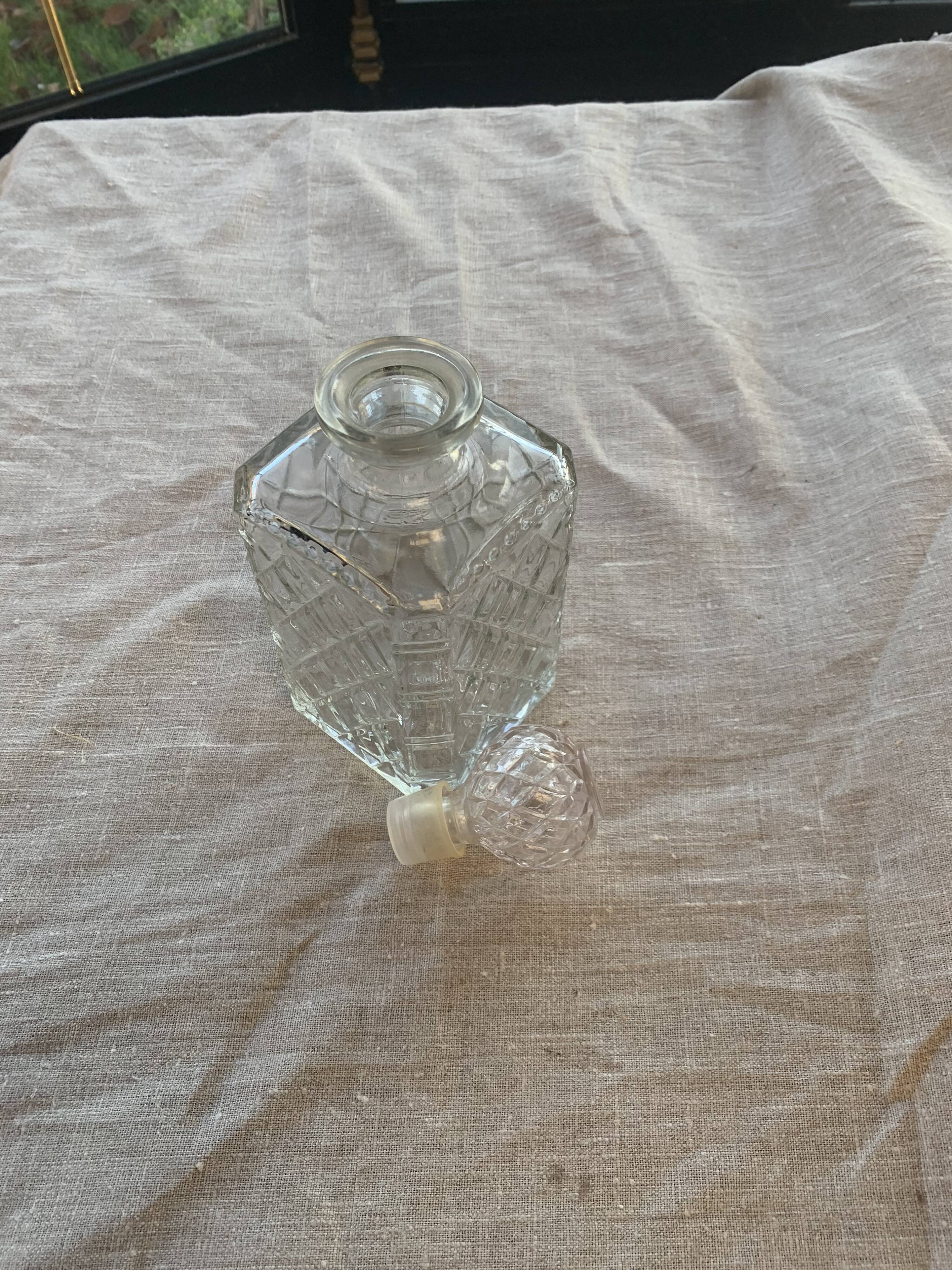 Vintage transparent molded glass whisky decanter