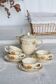 4 vintage ivory earthenware coffee cups and saucers - Floral pattern
