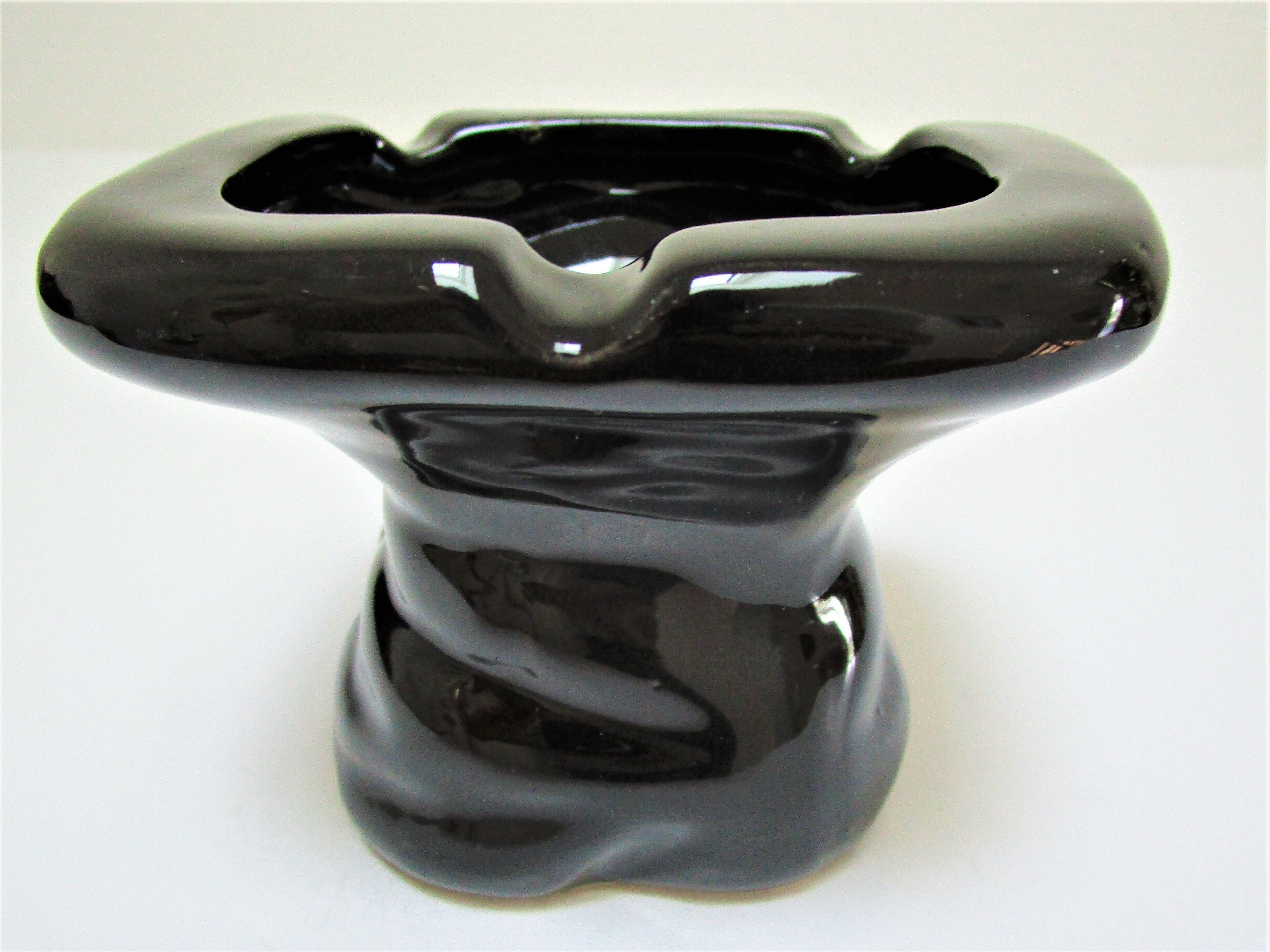 Anthropomorphic ashtray legs ceramic black design 80s