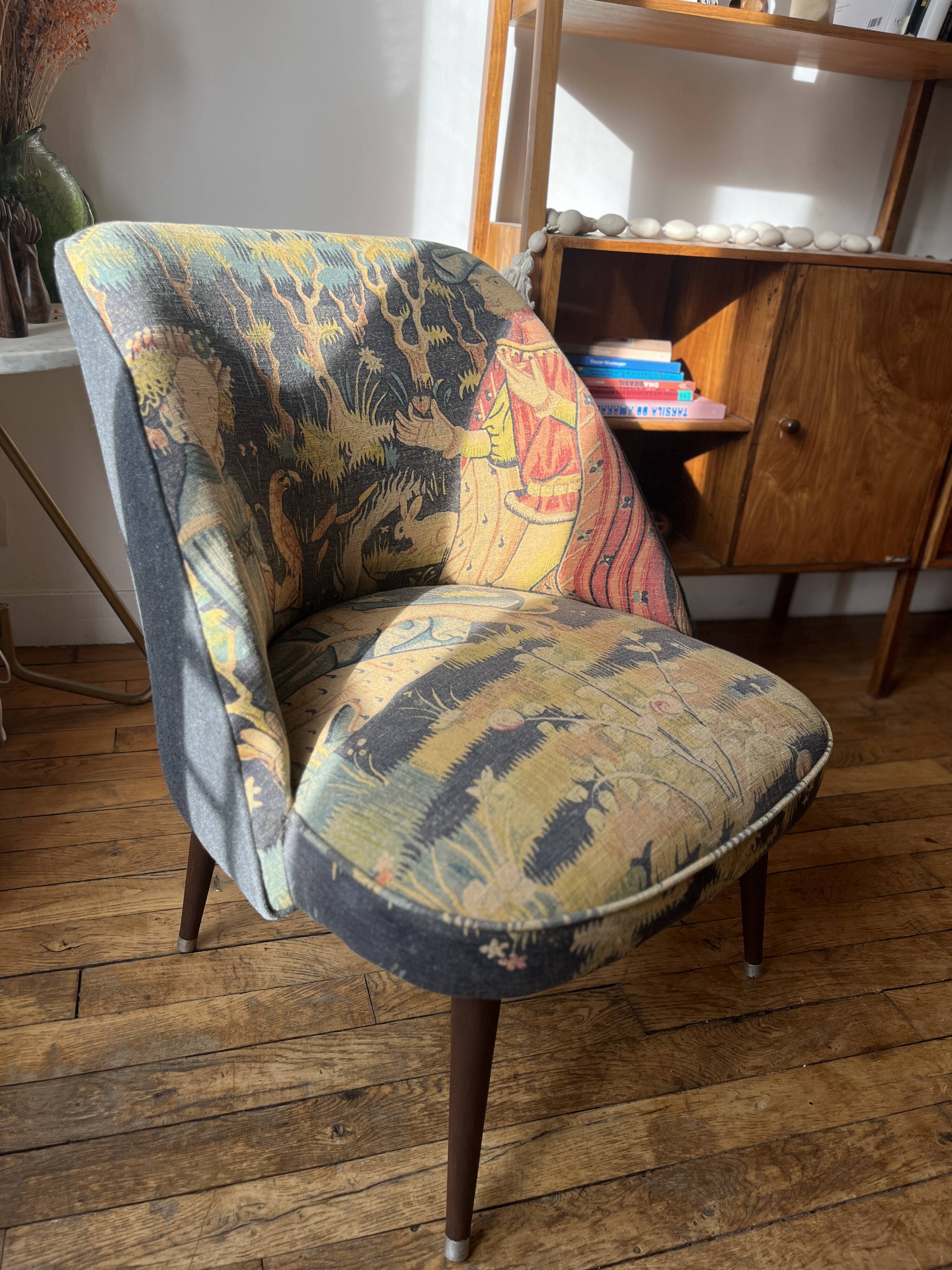 J. Tenreiro, Brazil. Concha armchair with tapered legs, Cluny tapestry 1400.