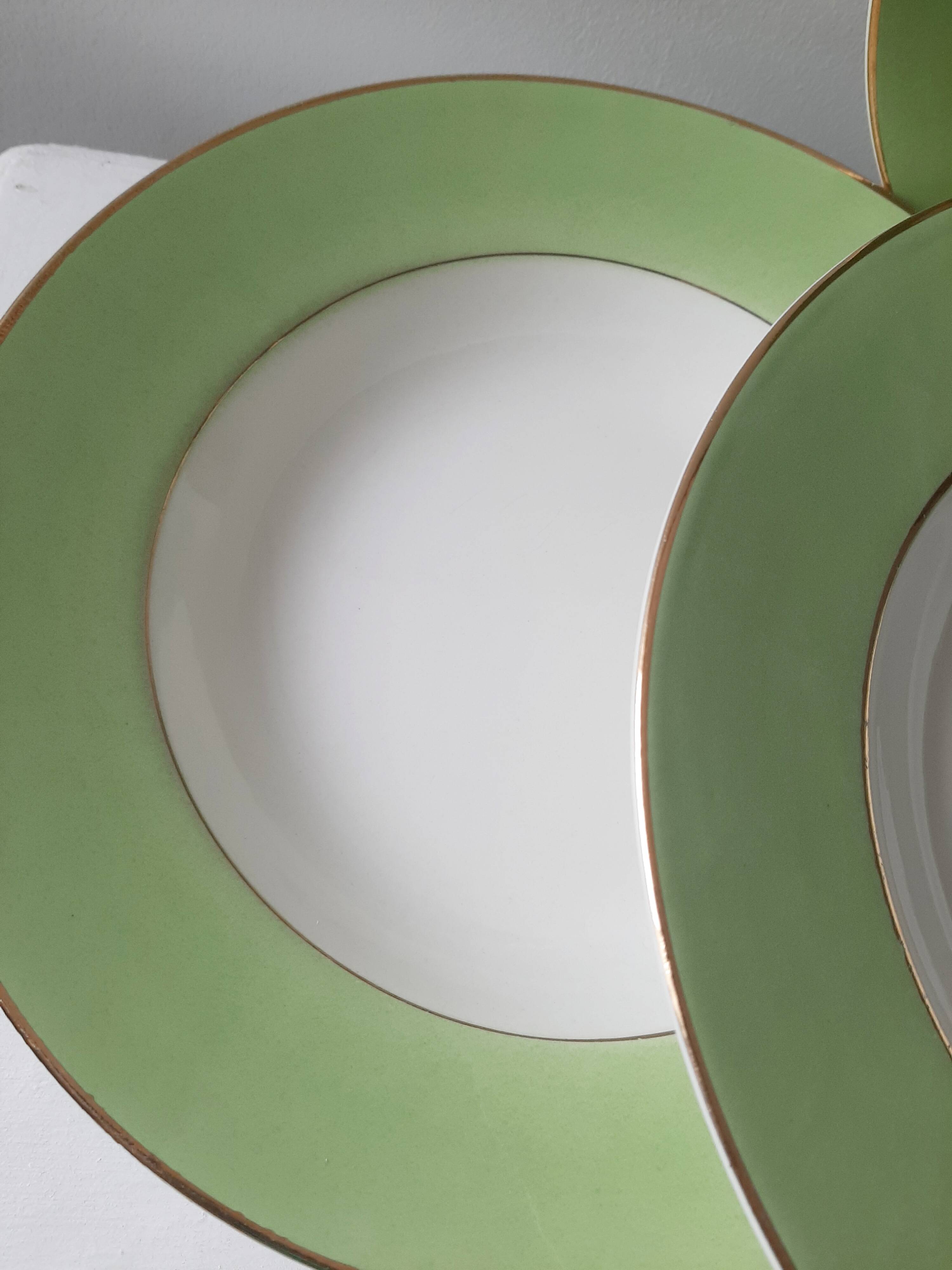 Vintage white and green deep plates stamped Arcachon.