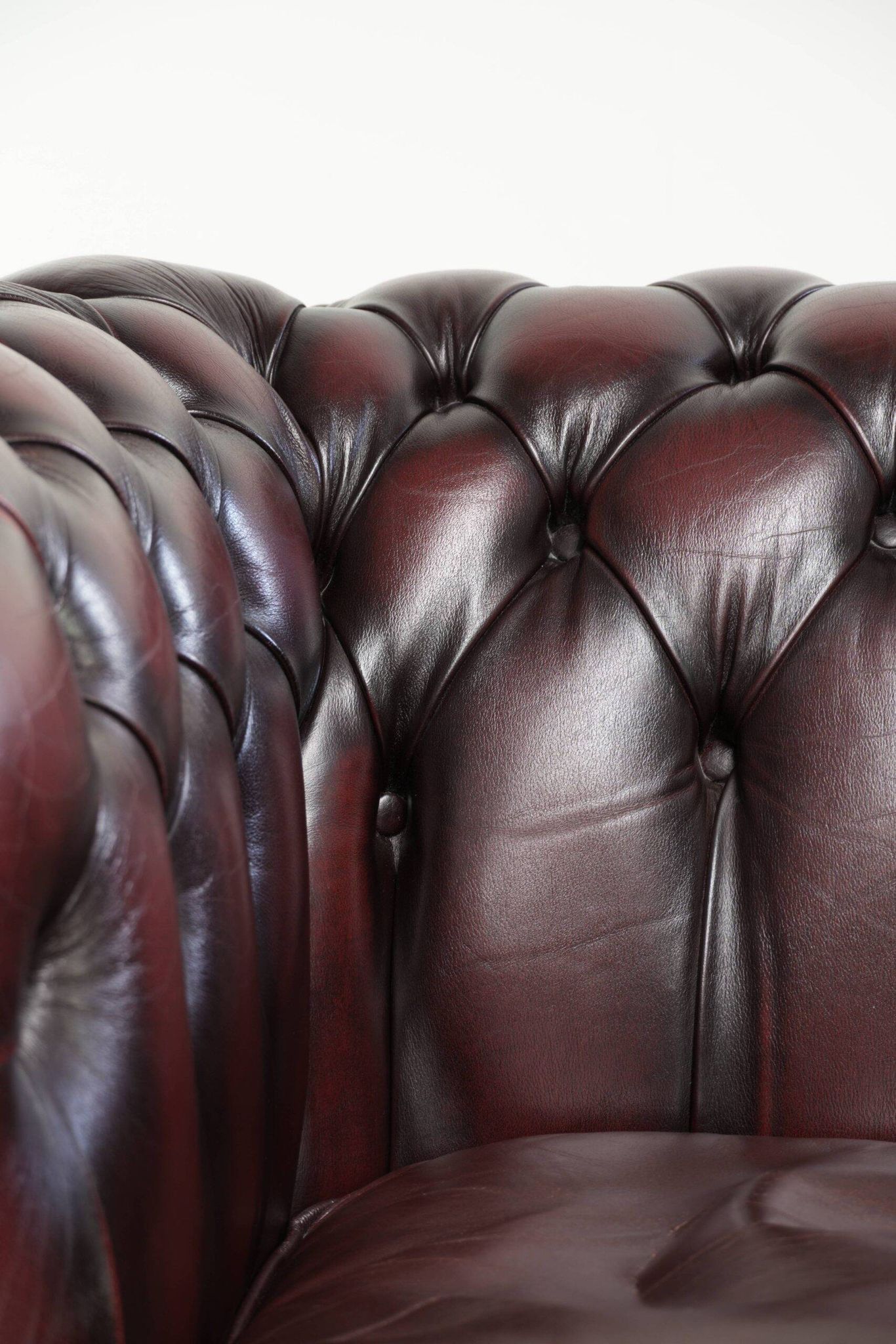 English cowhide Chesterfield club armchair in a beautiful red colour