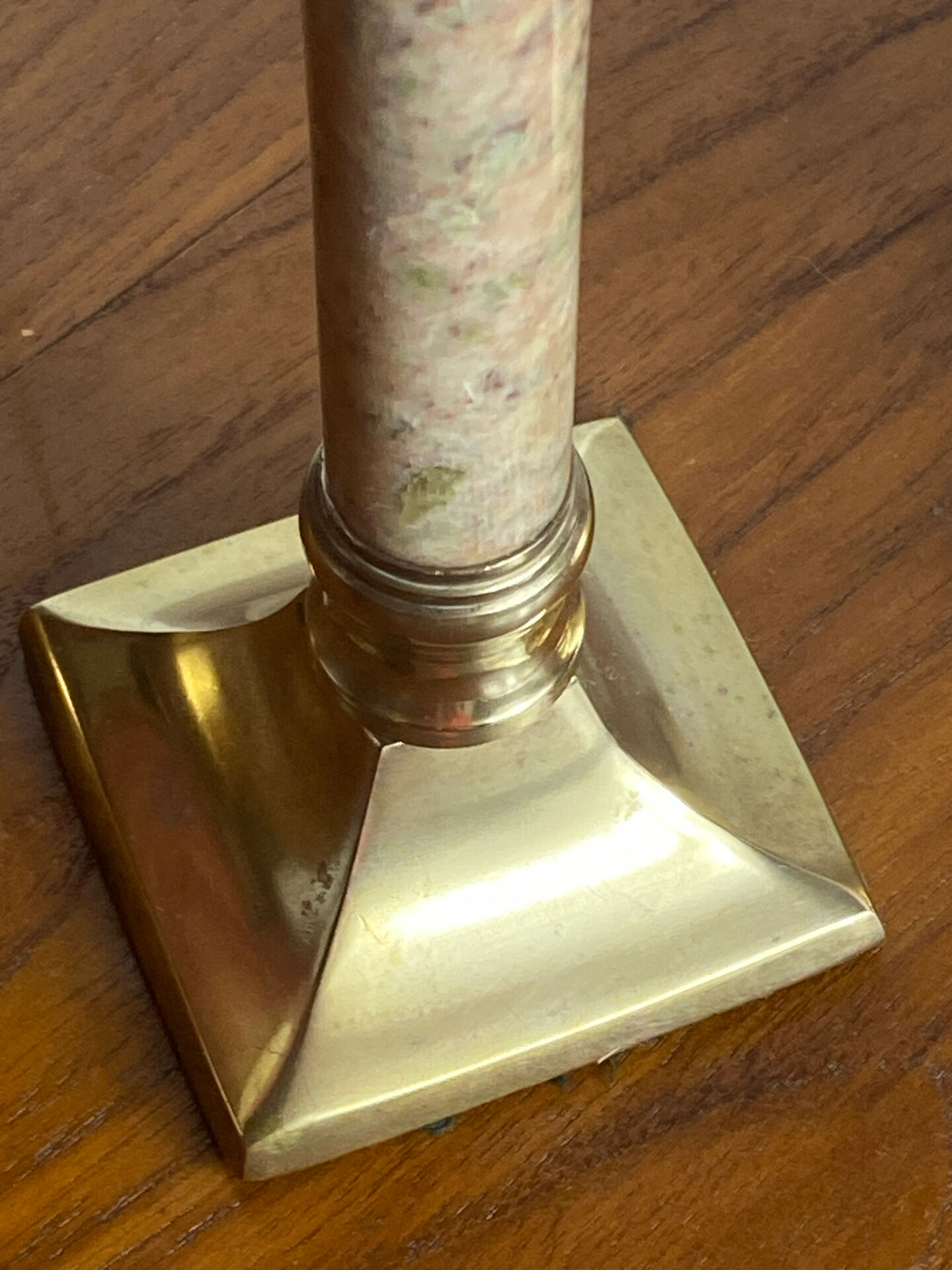 Pair of brass and stone candlesticks