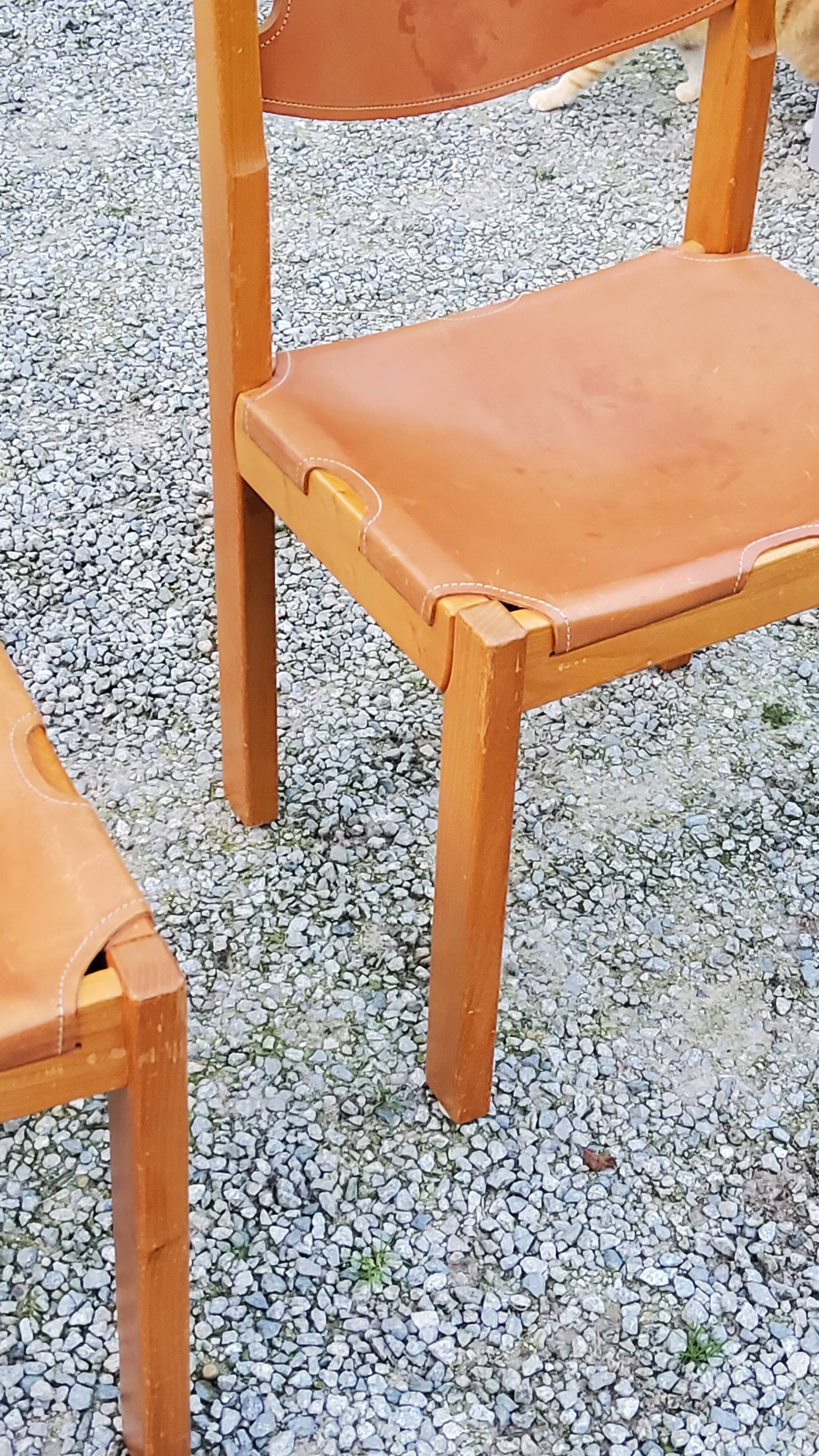 Pair of brutalist chairs in elm and stretched leather with saddle stitching Self publisher