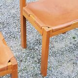 Pair of brutalist chairs in elm and stretched leather with saddle stitching Self publisher