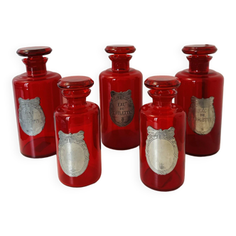 Apothecary, set of bottles, garnish or toiletries Pewter with rose