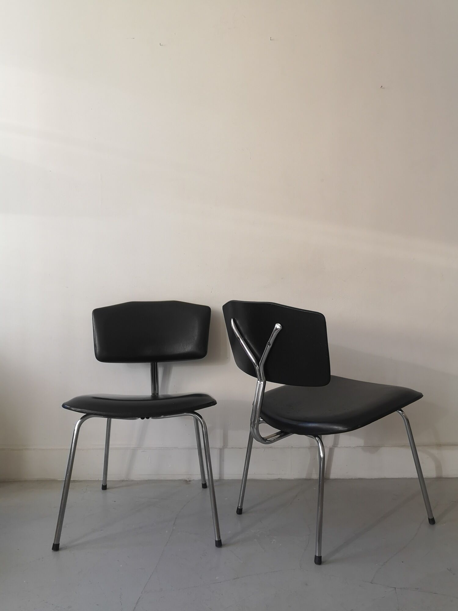 Pair of heaters design in black skai leather and metal, 1970