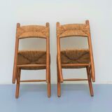 Pair of wooden chairs with seat and straw back