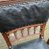 Two 19th-century Henri II chairs in solid wood and black leather upholstery