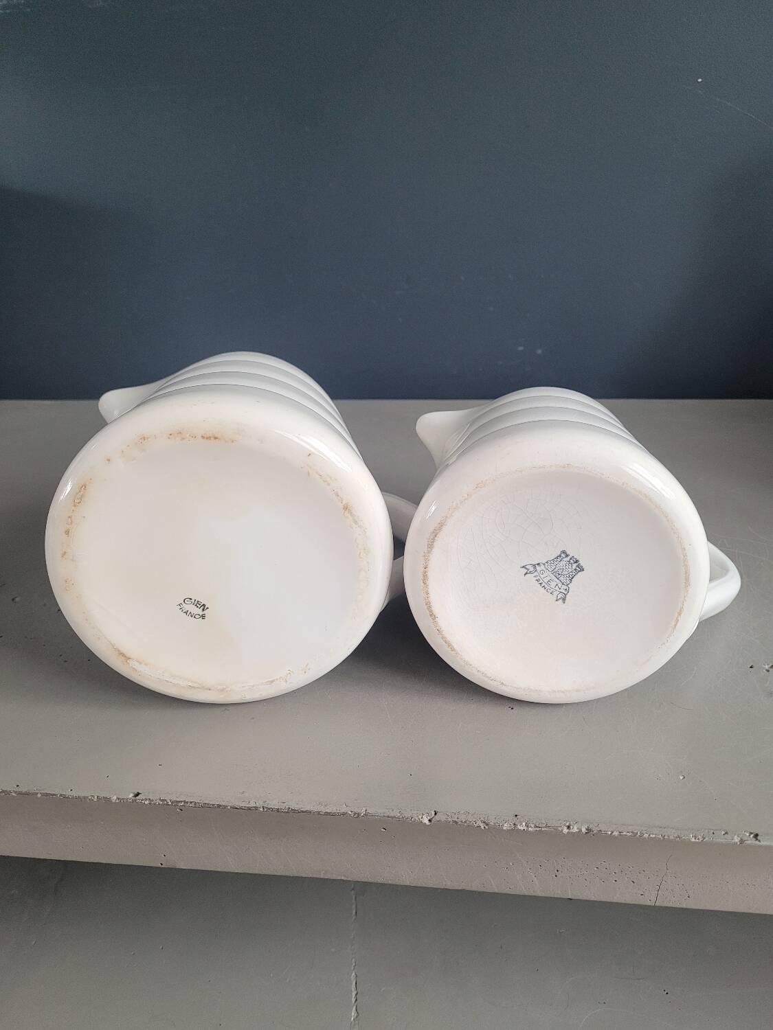 Pair of antique Gien porcelain pitchers
