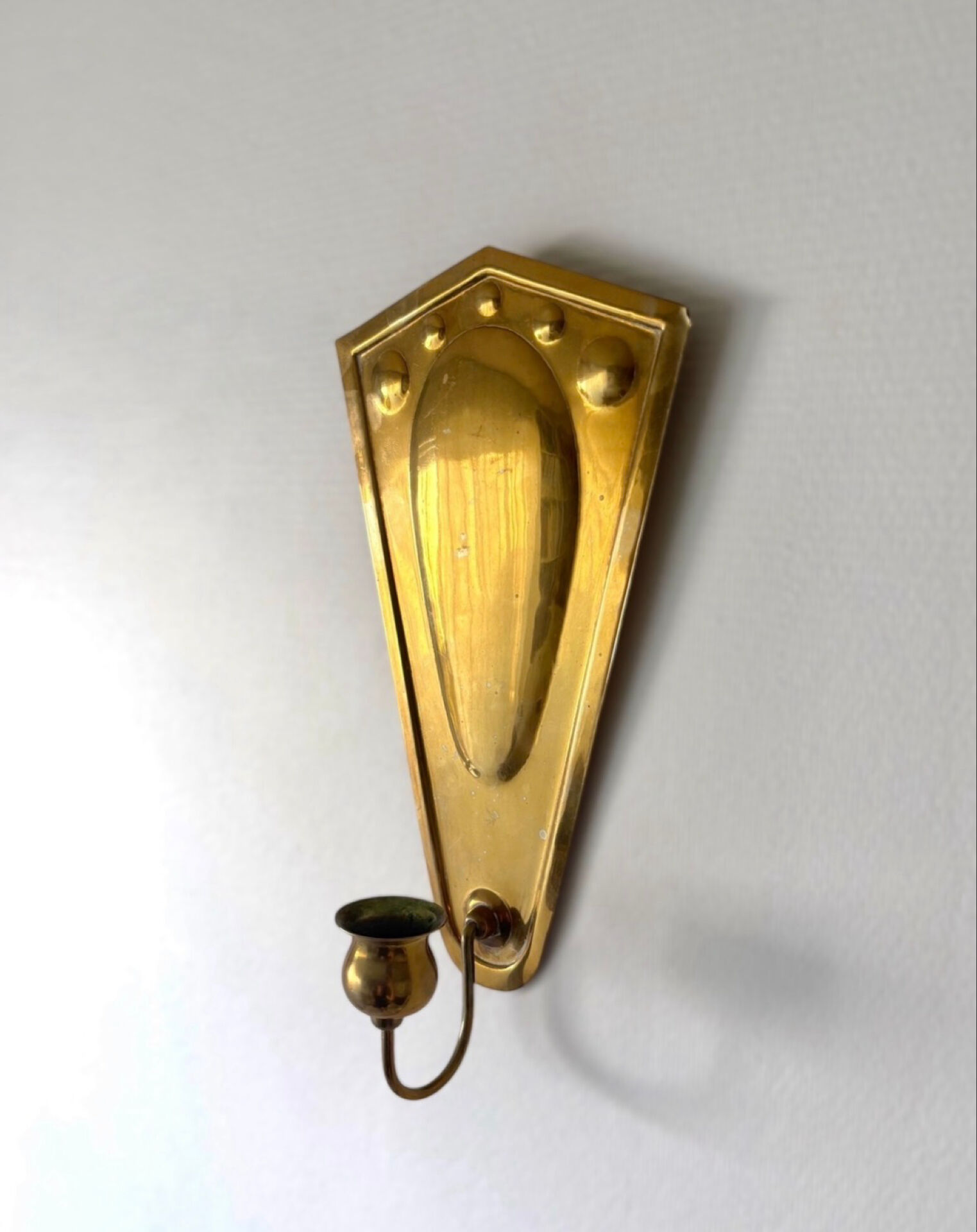 Scandinavian wall candle holders in brass
