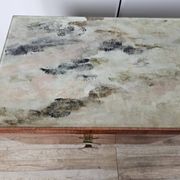 Mid-century drawer chest in mahogany, brass and glass.