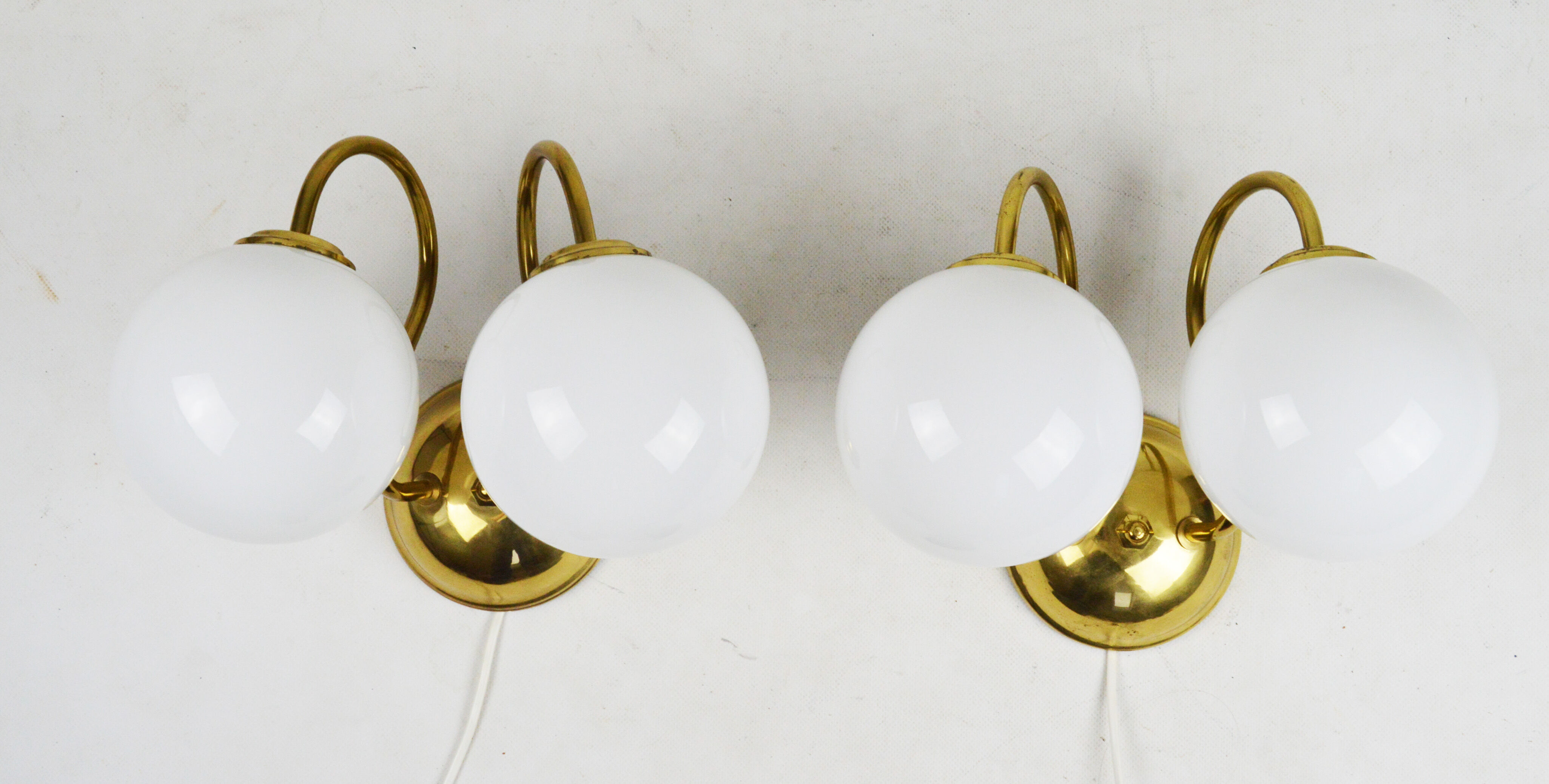 A pair of wall lamps, Poland, 1980s