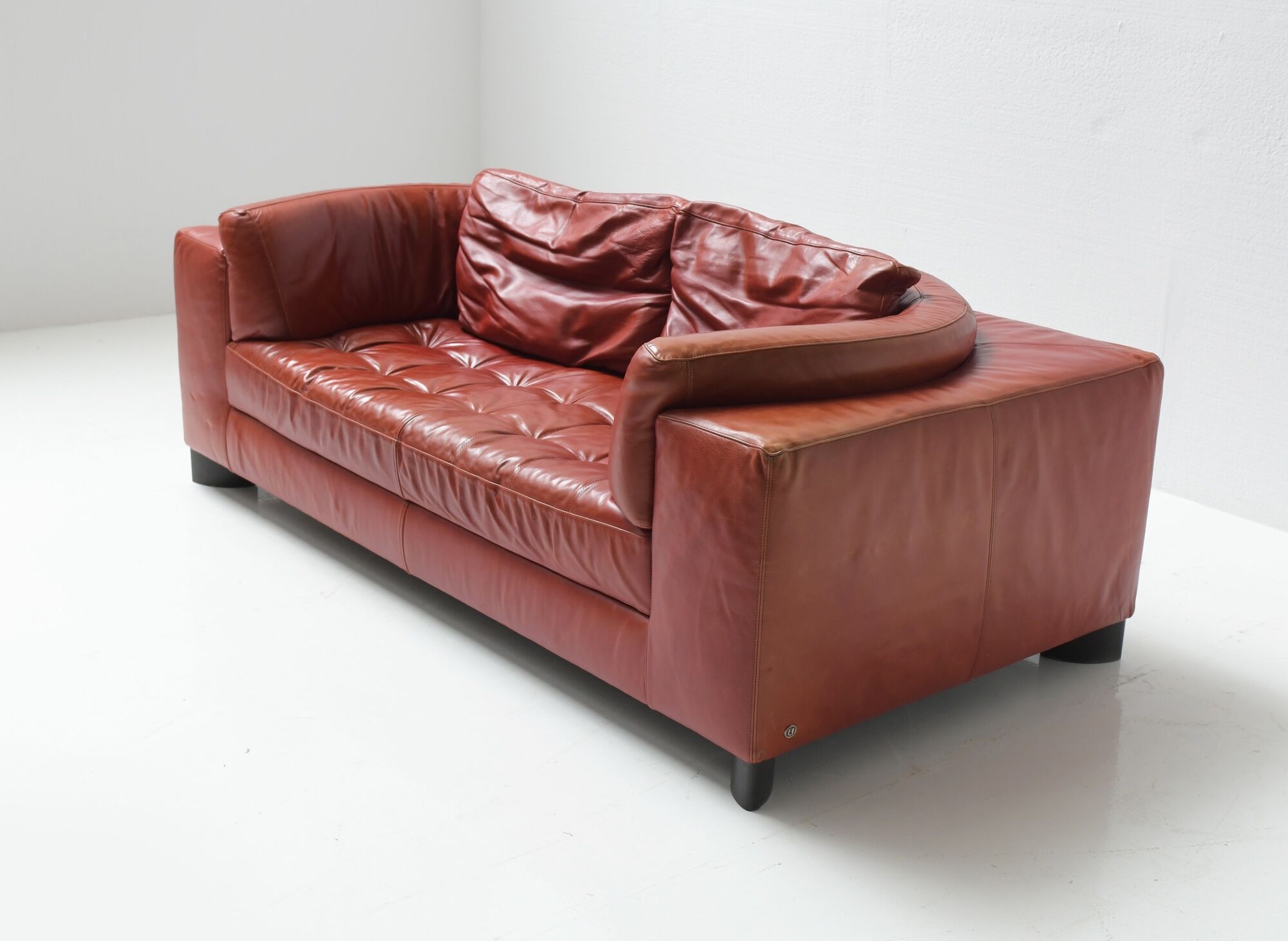 Vintage Osaka loveseat in oxblood leather by Natuzzi Italy