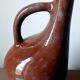 Rare and old dark brown pot-bellied jug. Made in Cuba