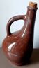 Rare and old dark brown pot-bellied jug. Made in Cuba