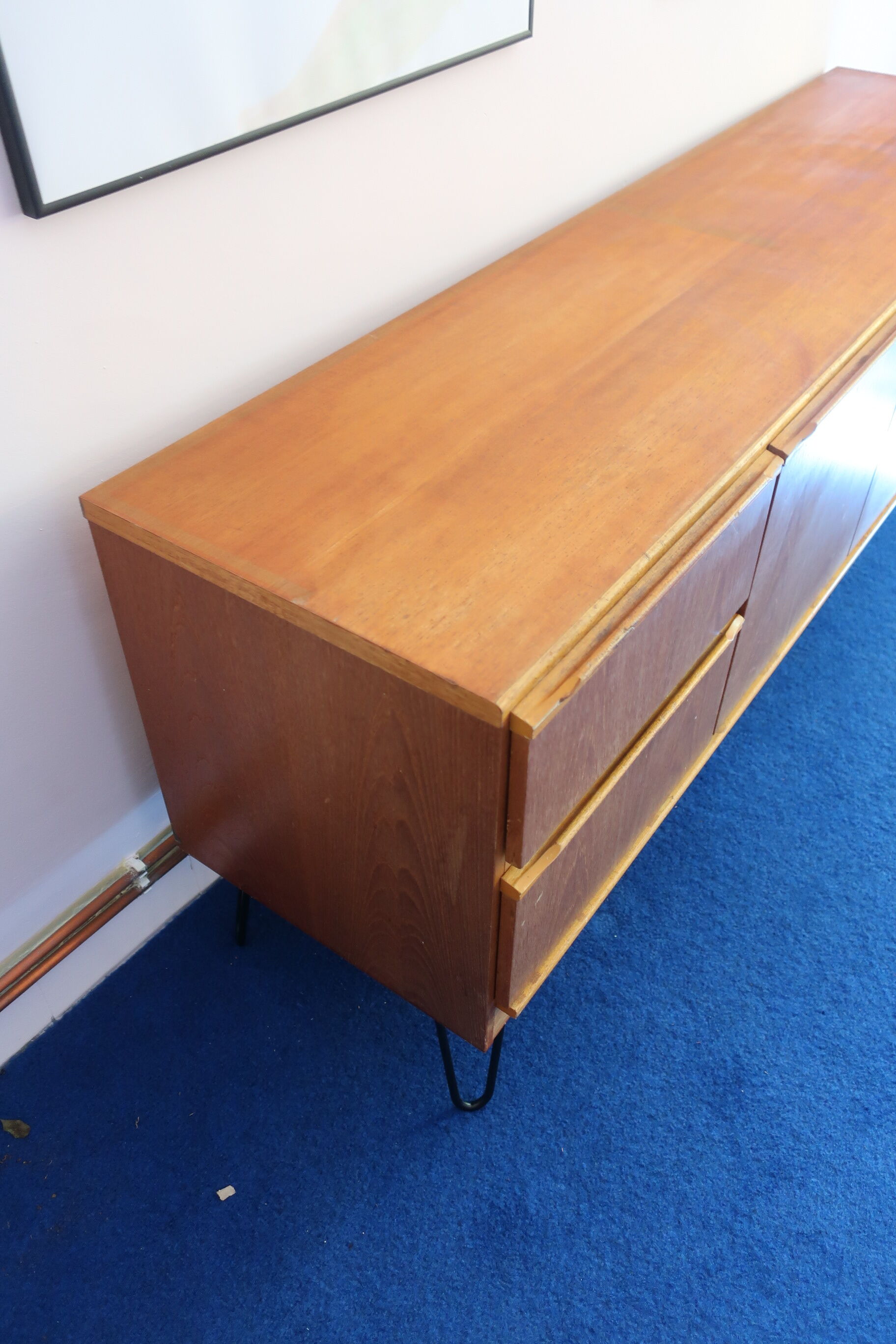 Teak sideboard from the 60s/70s pins