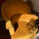 Paire de fauteuils crapaud jaune beige velours frange