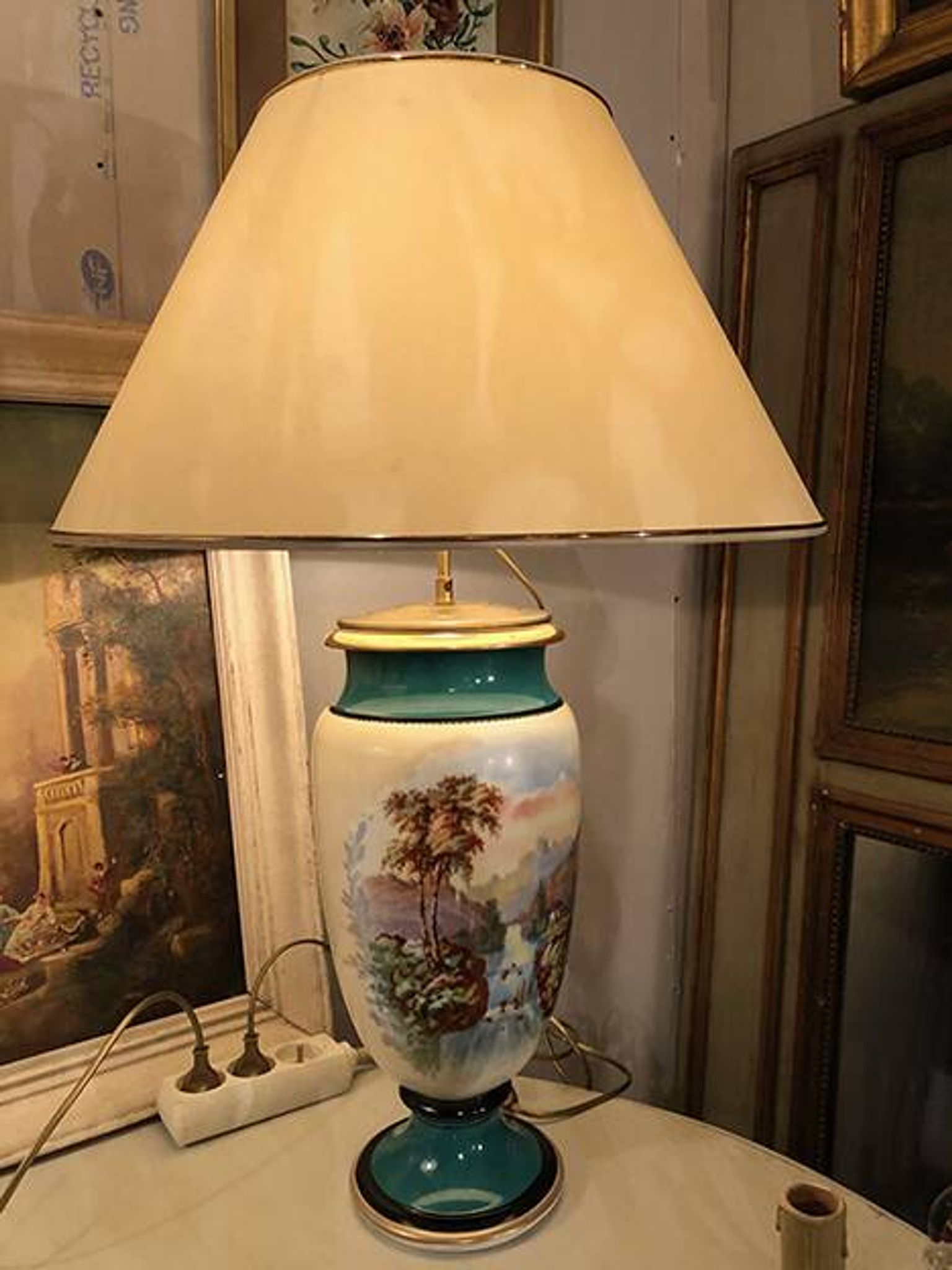 Large pair of 19th century polychrome porcelain vases decorated with landscapes, mounted as lamps