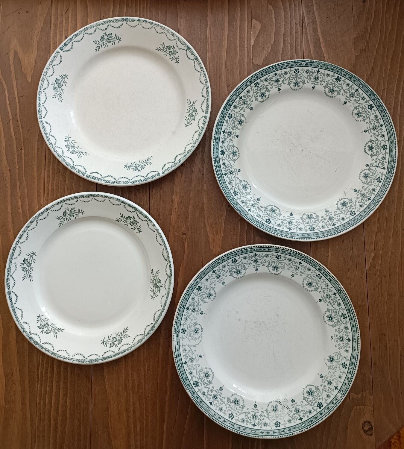 Set of 4 mismatched iron earth plates