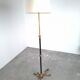 Art and Craft tripod floor lamp in bronze.