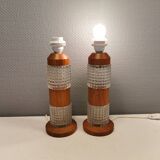 Swedish table lamps made of teak wood and hard pressed crystal glass.