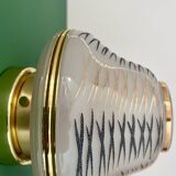 Vintage Art Deco globe wall/ceiling light in white, black, and gold glass.